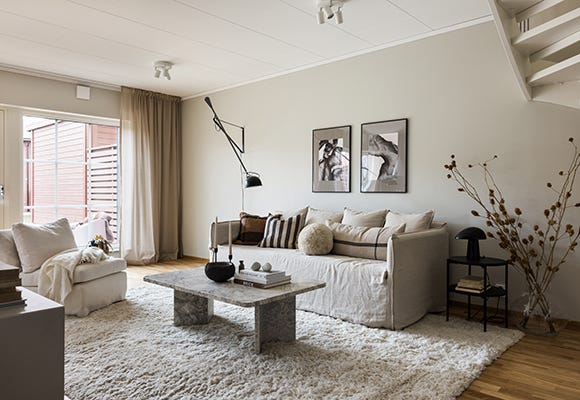 Nyproduktion i Steninge slottsby - vardagsrum med öppen planlösning