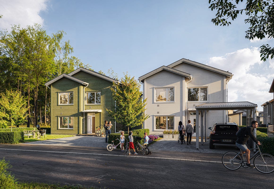 Visualisering av två hus med barn som leker på framsidan.
