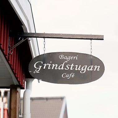 Foto på skylten på Café Grindstugan i Tollare